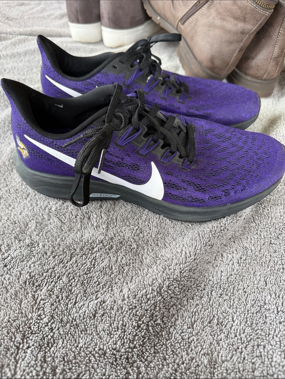 Nike men’s  Purple and Black Running Shoes with White Swoosh Vikings.